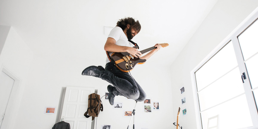 Guitarist air jump while playing